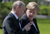 Путин обсудил с Меркель ситуацию с мигрантами на границе Беларуси